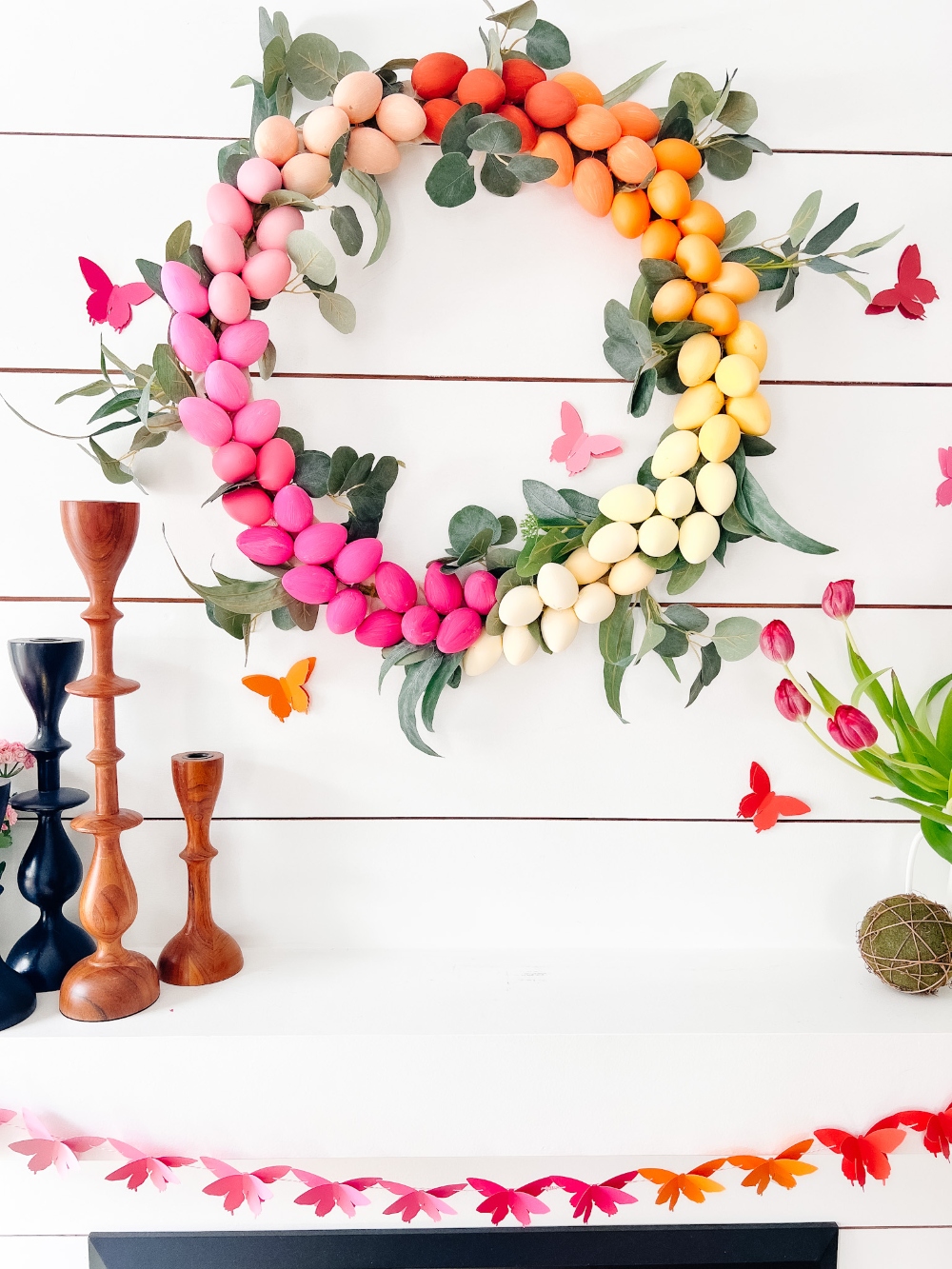 Rainbow Easter Mantel. Celebrate color this Easter by making a rainbow egg wreath and paper butterfly banner! 
