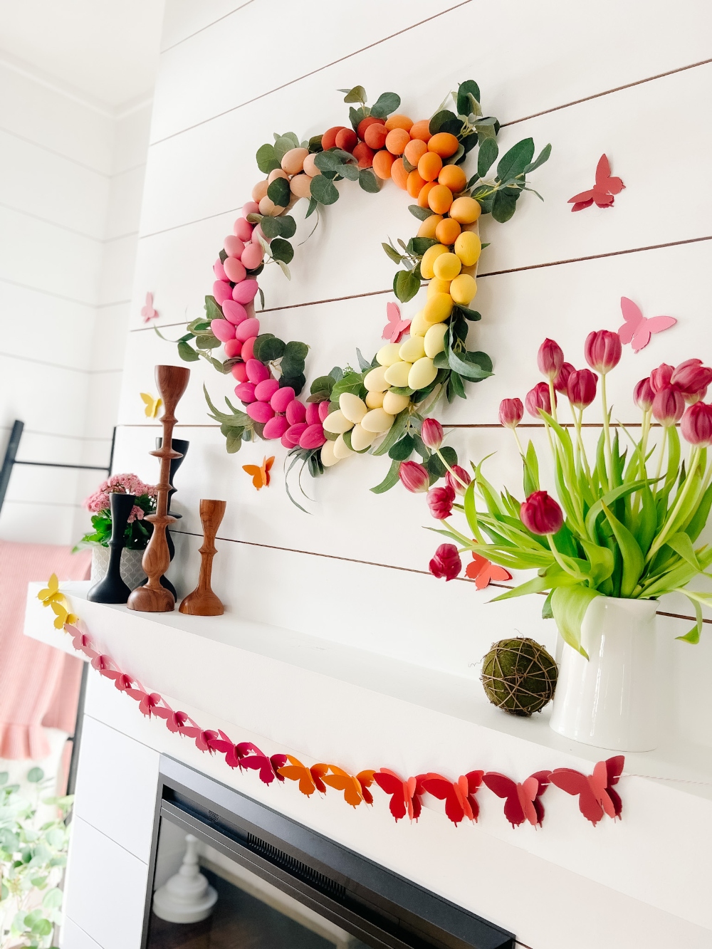 Rainbow Easter Mantel. Celebrate color this Easter by making a rainbow egg wreath and paper butterfly banner! 