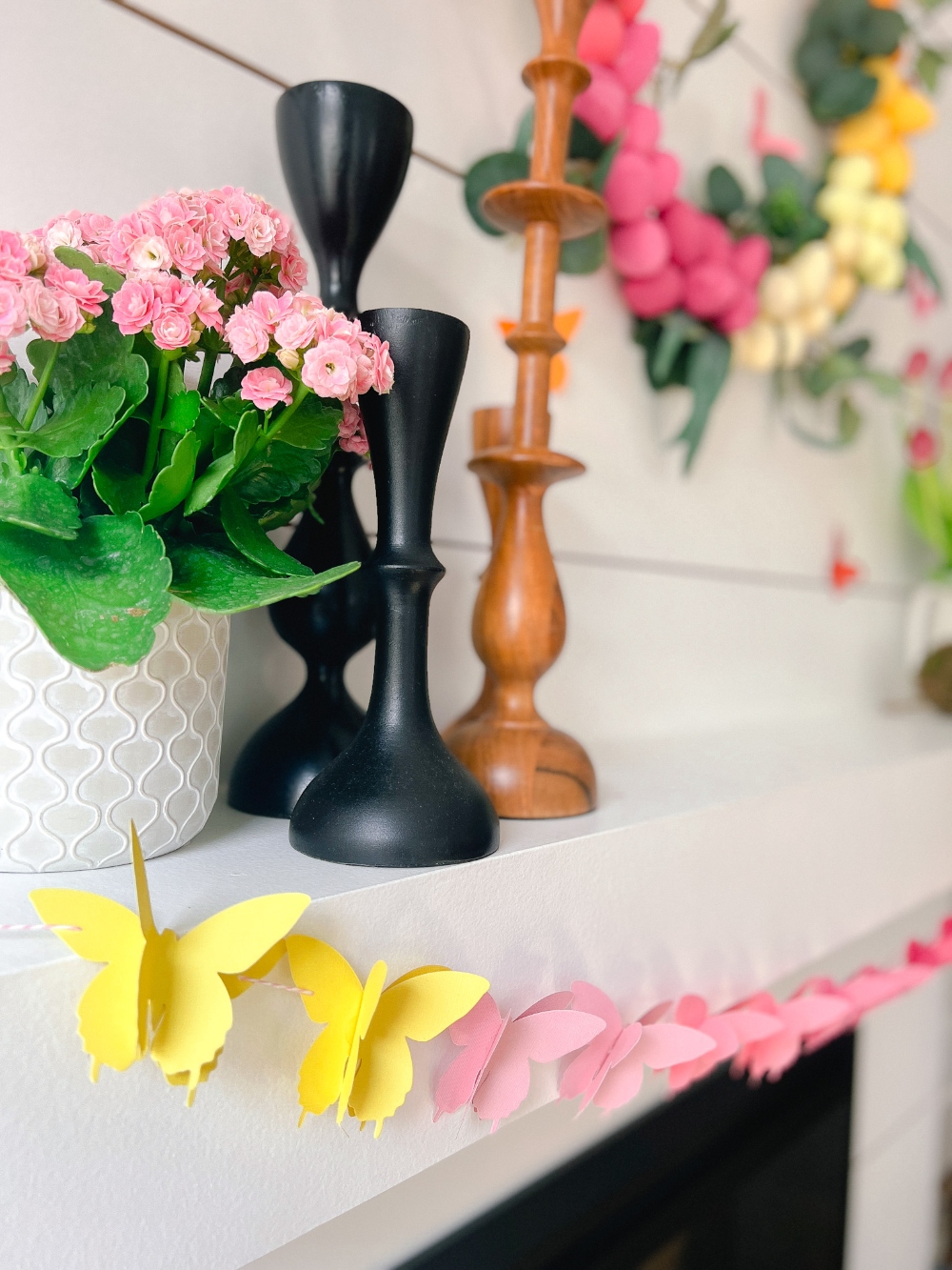 Rainbow Easter Mantel. Celebrate color this Easter by making a rainbow egg wreath and paper butterfly banner! 