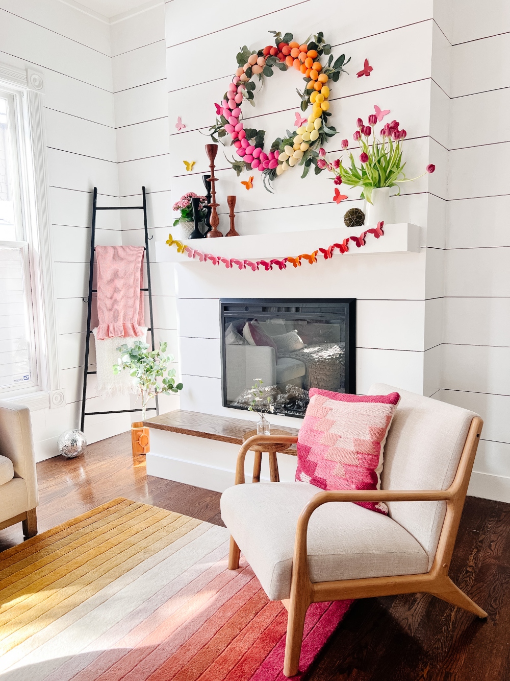 Rainbow Easter Mantel. Celebrate color this Easter by making a rainbow egg wreath and paper butterfly banner! 