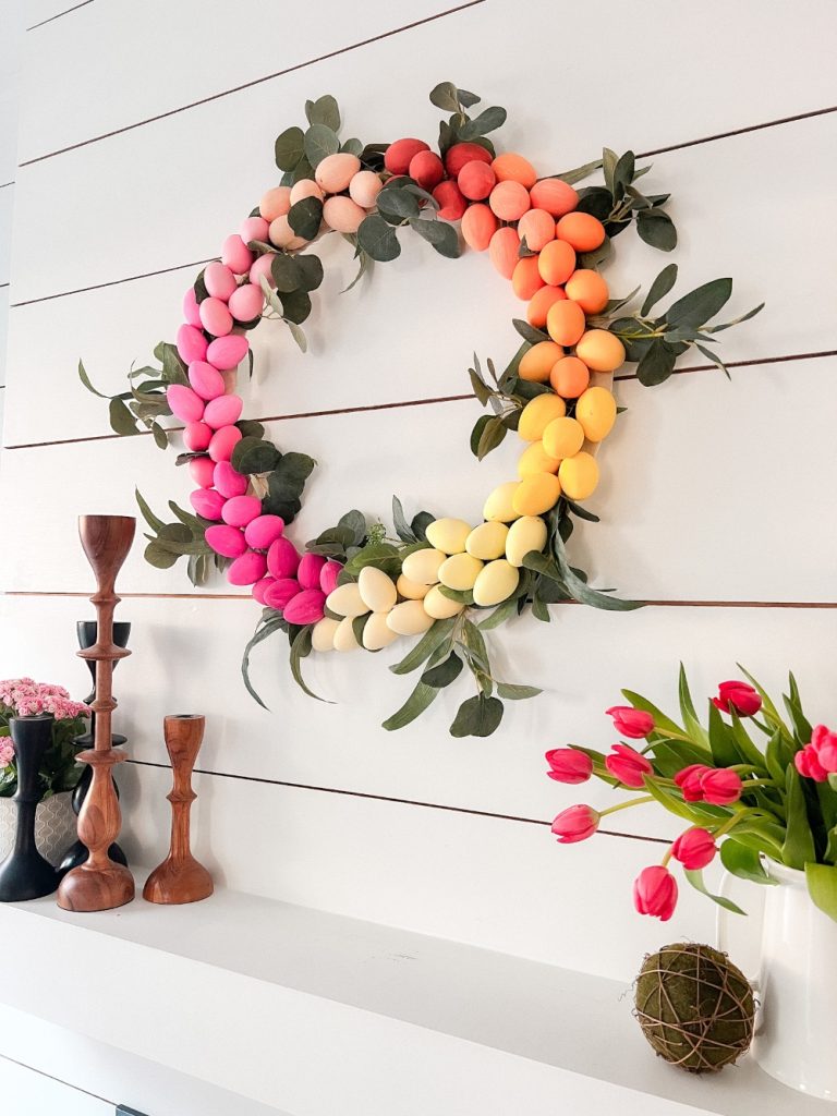 Colorful Ombre Easter Egg Wreath. Celebrate spring by creating a bright and colorful ombre egg wreath to match YOUR decor!