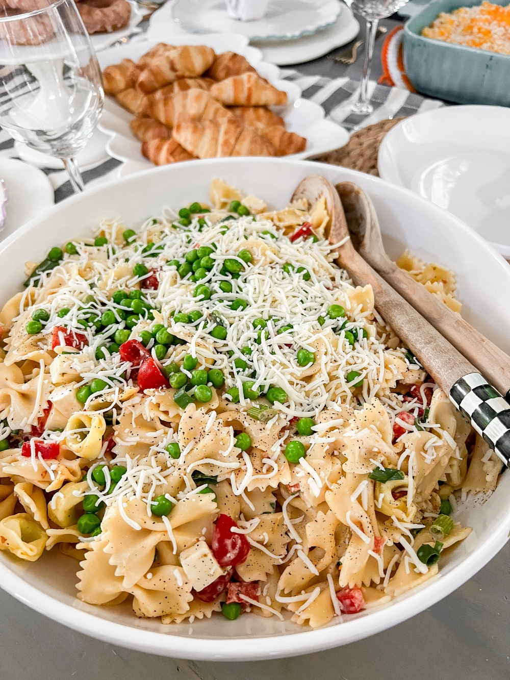 Bow Tie Tortellini Pasta Salad. Creamy bow tie pasta and cheese-filled tortellini combined with cubes of spicy  cheese, crisp veggies and a creamy tangy sauce makes a dreamy summer salad.