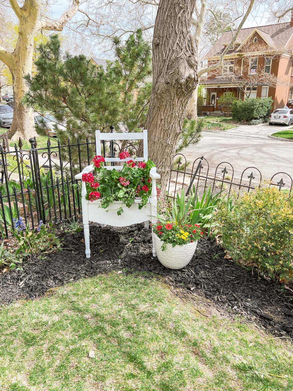 Spring DIY Upcycled Chair Planter. Take a broken chair and give it new life by planting beautiful flowers in it to enjoy in your yard!