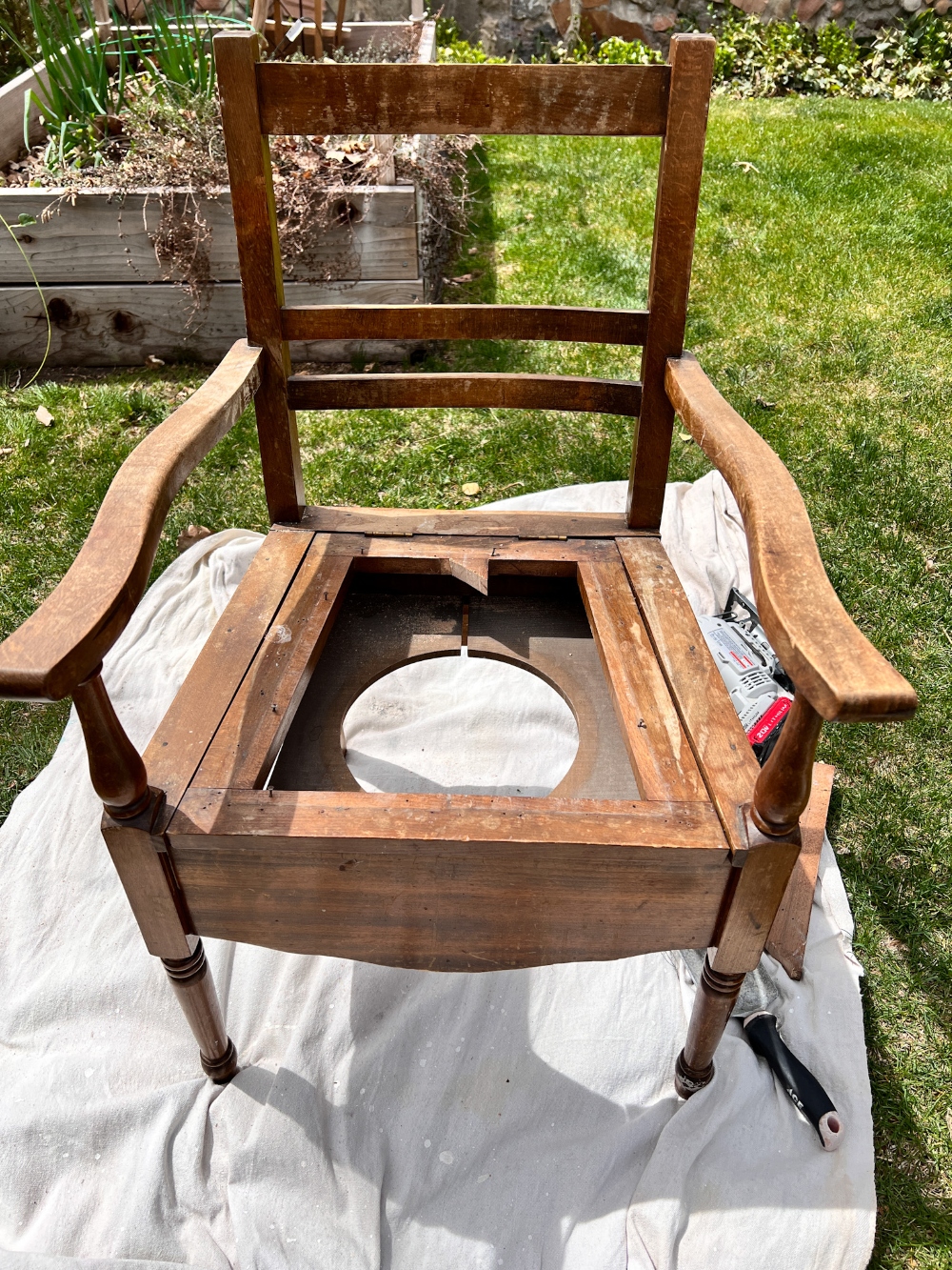 Spring DIY Upcycled Chair Planter. Take a broken chair and give it new life by planting beautiful flowers in it to enjoy in your yard!