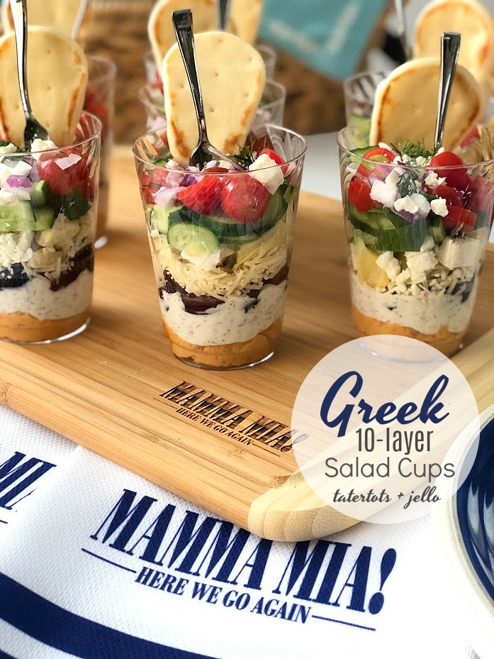 Greek 10-Layer Salad Mini Cups are the perfect appetizer for any party! Full of delightful layers of creamy, spicy and crunchy layers, this 10-layer dip will be unforgettable! 
