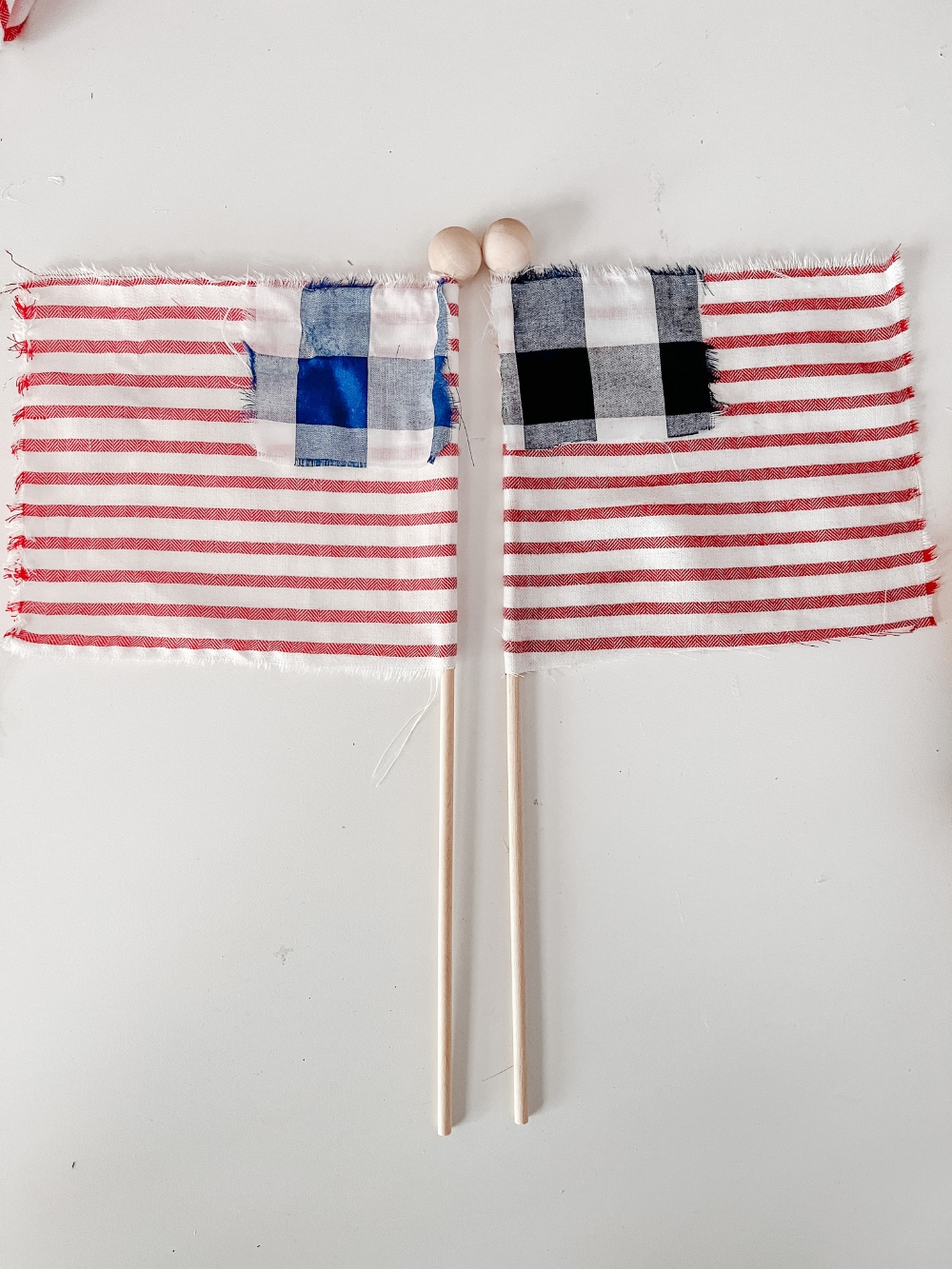 No-Sew Patriotic Scrap Flags. Mix and match left-over fabric to create pretty patriotic flags that can be used to decorate this summer!
