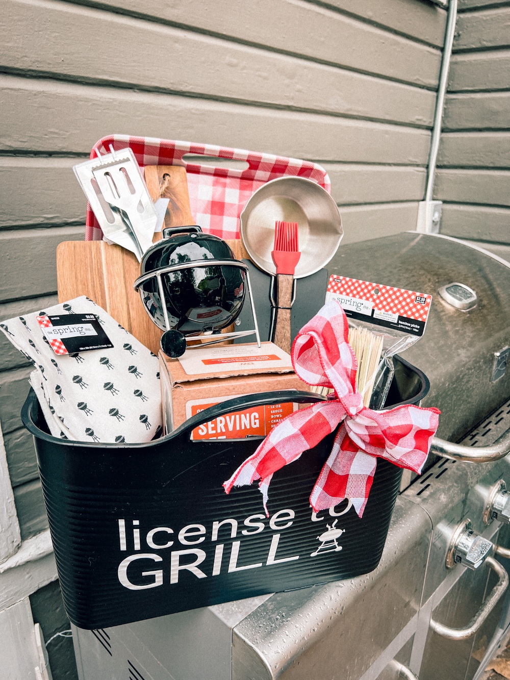 License to Grill Father's Day Gift Basket. Celebrate the dads in your life by creating a fun grilling gift basket with personalized basket and BBQ apron!