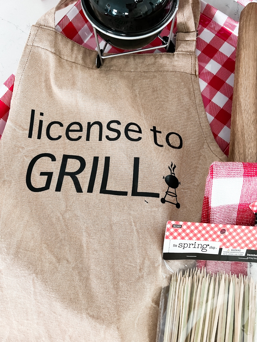 License to Grill Father's Day Gift Basket. Celebrate the dads in your life by creating a fun grilling gift basket with personalized basket and BBQ apron!