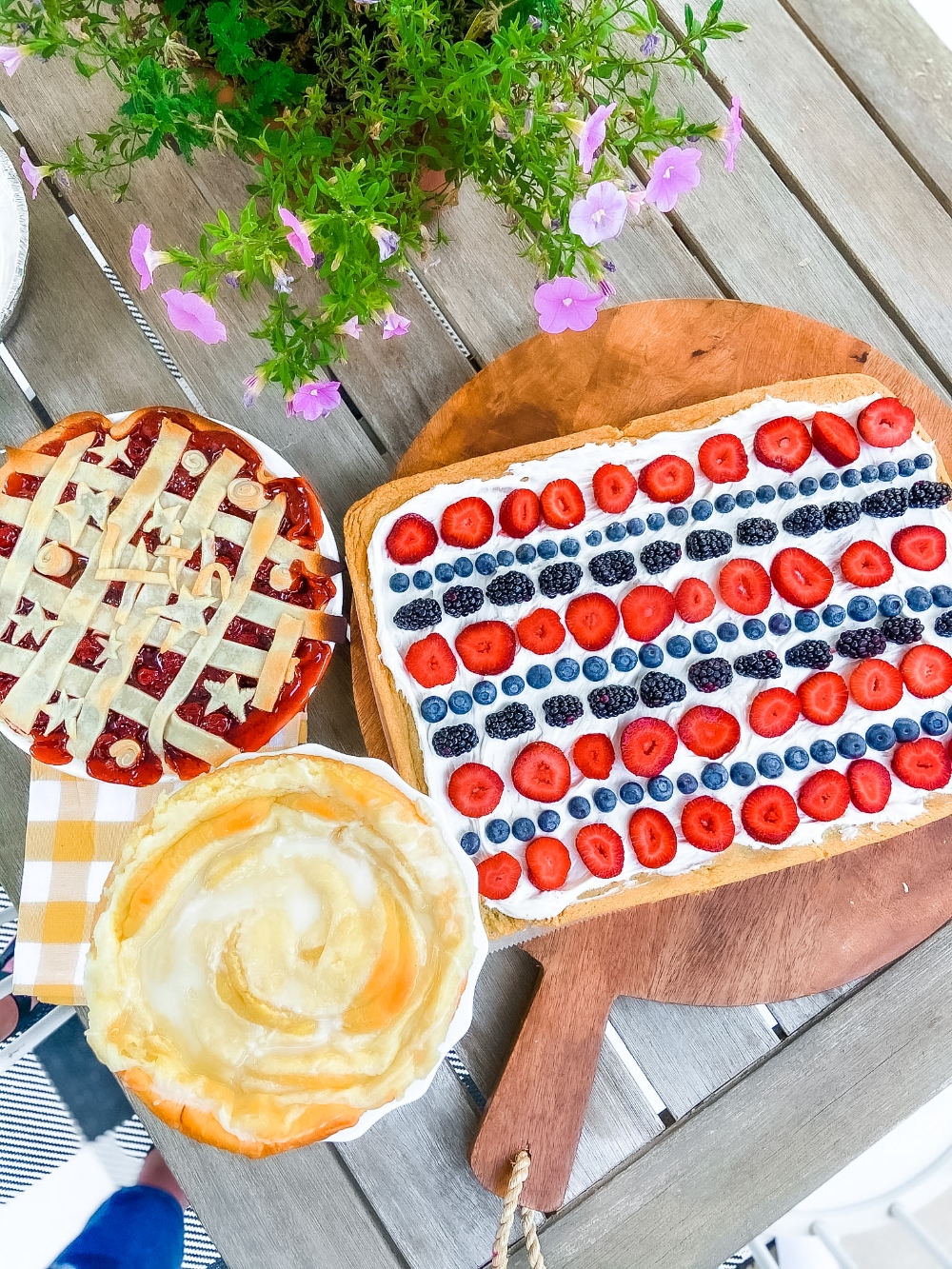 Patriotic Fruit Pizza Dessert. Chewy cookie crust is layered with light creamy topping and topped with fresh sweet berries for an easy semi-homemade summer dessert! 