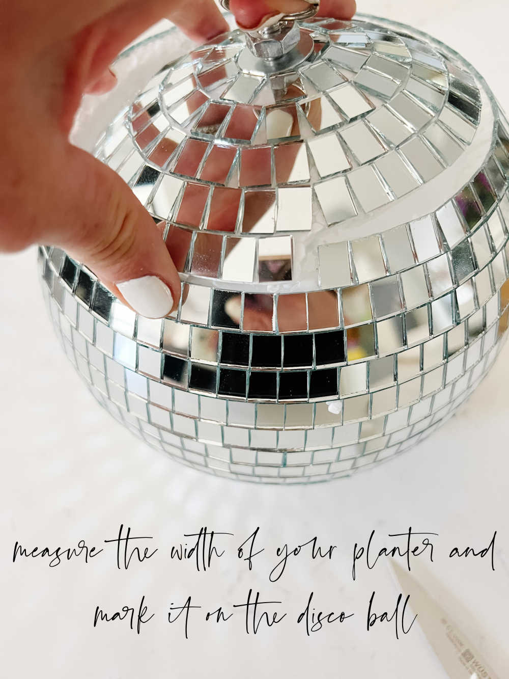 DIY Summer Disco Ball Planter. Turn a disco ball into a whimsical, sparkling summer centerpiece in less than 5 minutes!