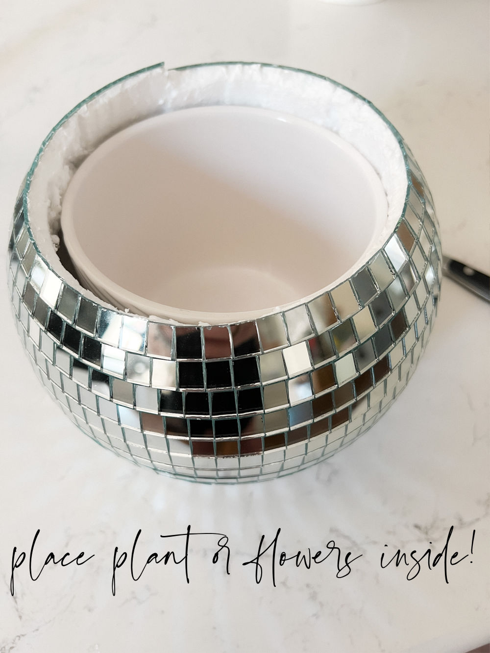 DIY Summer Disco Ball Planter. Turn a disco ball into a whimsical, sparkling summer centerpiece in less than 5 minutes!