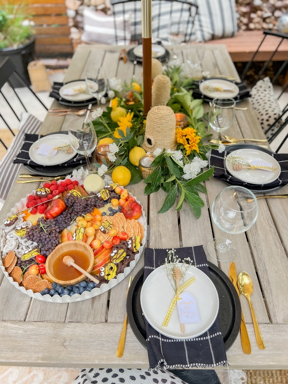 Honey-Themed Dessert Board with Pretzel Bees. Create a whimsical and delicious dessert board with sweet fruits, snacks and adorable pretzel bees.  