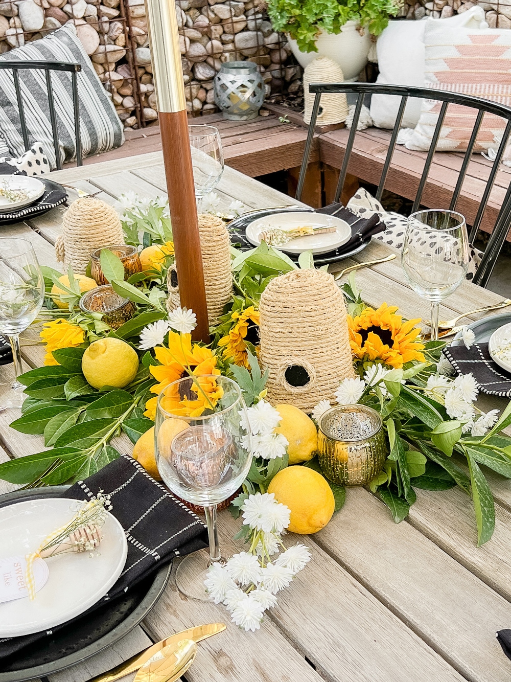 Summer Honey-Themed Outdoor Dining. Celebrate warm weather and summer with a honey-themed dinner, handmade beehives, honey dipper gift and bee-themed dessert board!