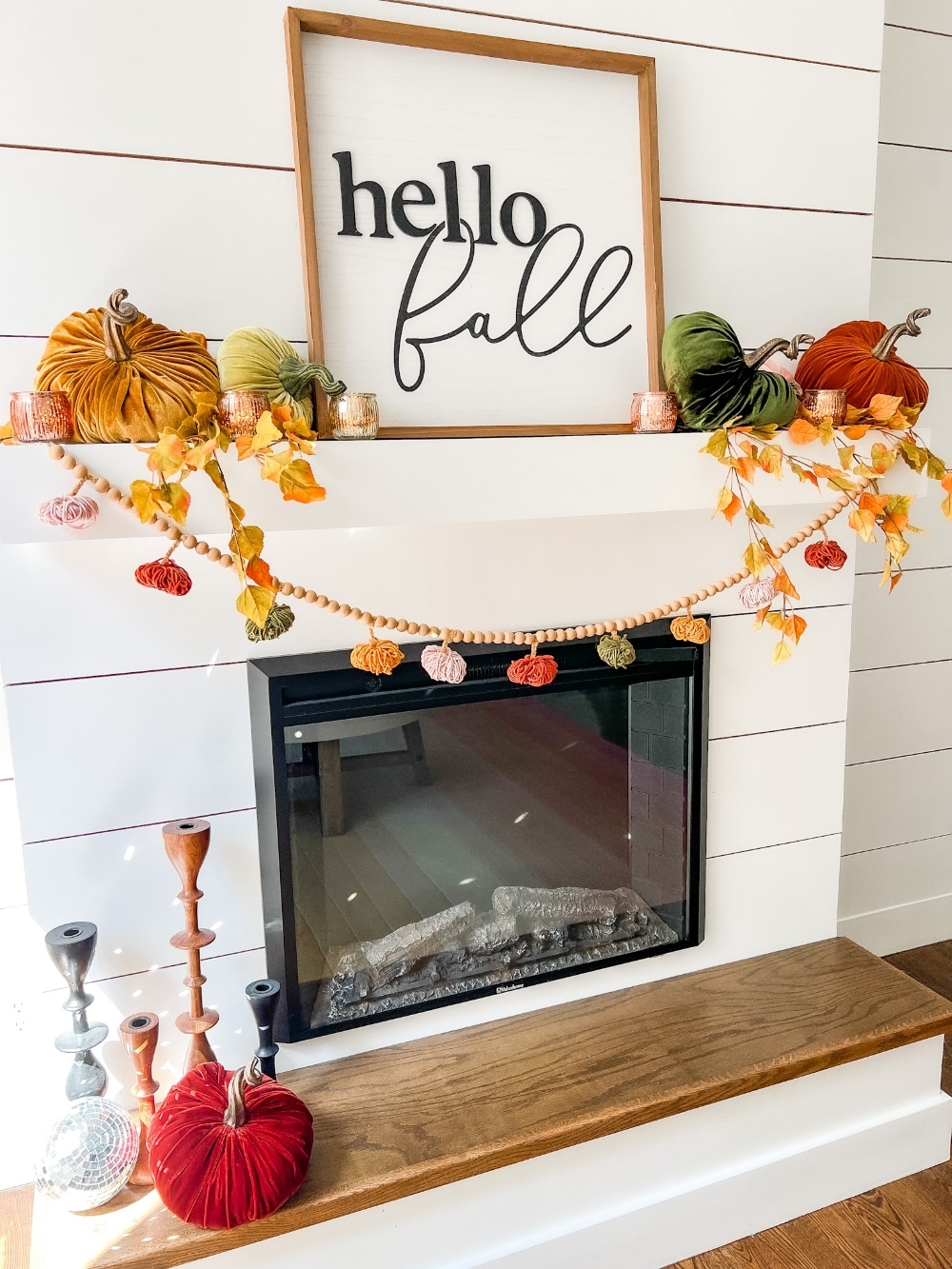 all Mantel and DIY Yarn Pumpkin Garland. Create a cozy layered mantel with a beautiful fall sign, foliage, vibrant fall pumpkins and A matching DIY yarn pumpkin garland! 