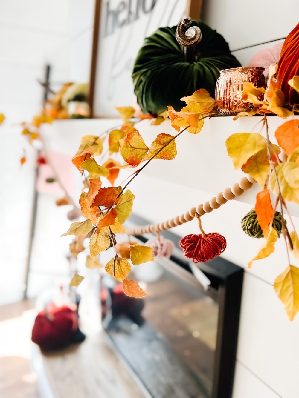 all Mantel and DIY Yarn Pumpkin Garland. Create a cozy layered mantel with a beautiful fall sign, foliage, vibrant fall pumpkins and A matching DIY yarn pumpkin garland! 