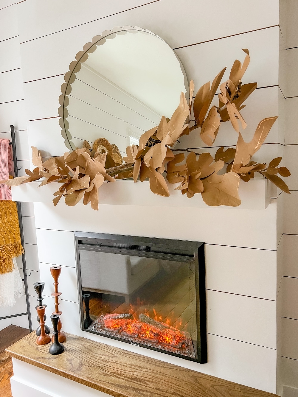 Paper Bag Leaf Garland. Upcycle your old paper grocery store bags into a warm and vibrant paper leaf garland for a mantel or shelf for Fall! 