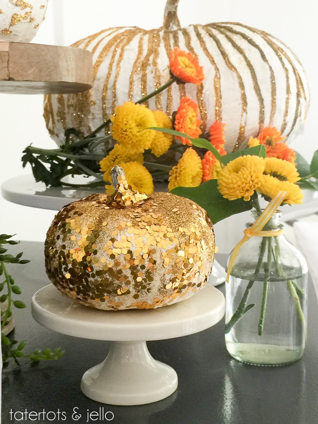 gold glitter and grout pumpkins 