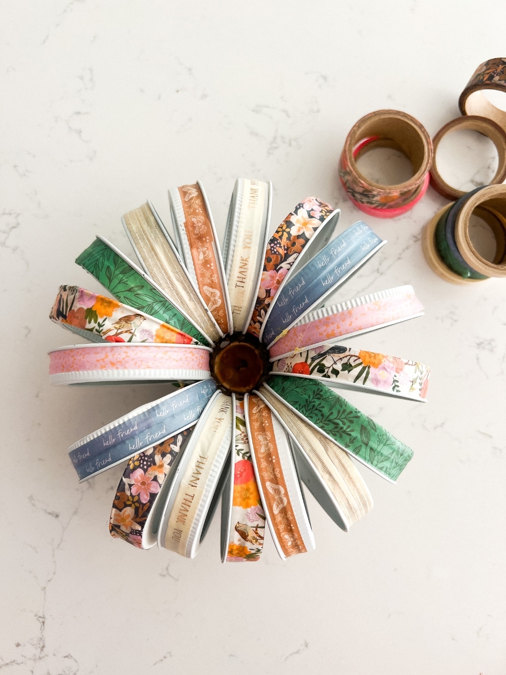 Washi Tape Mason Jar Lid Pumpkin. Upcycle your mason jar lids into this sweet and colorful pumpkin! 