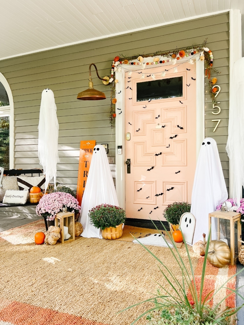 Easy Halloween Ghost Porch. Create tomato cage ghost luminaries, floating ghost luminaries and a ghost doormat for spooky fun!