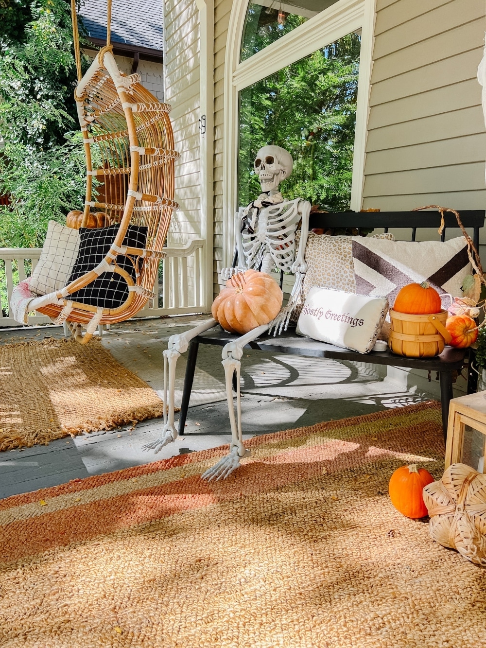 Easy Halloween Ghost Porch. Create tomato cage ghost luminaries, floating ghost luminaries and a ghost doormat for spooky fun!