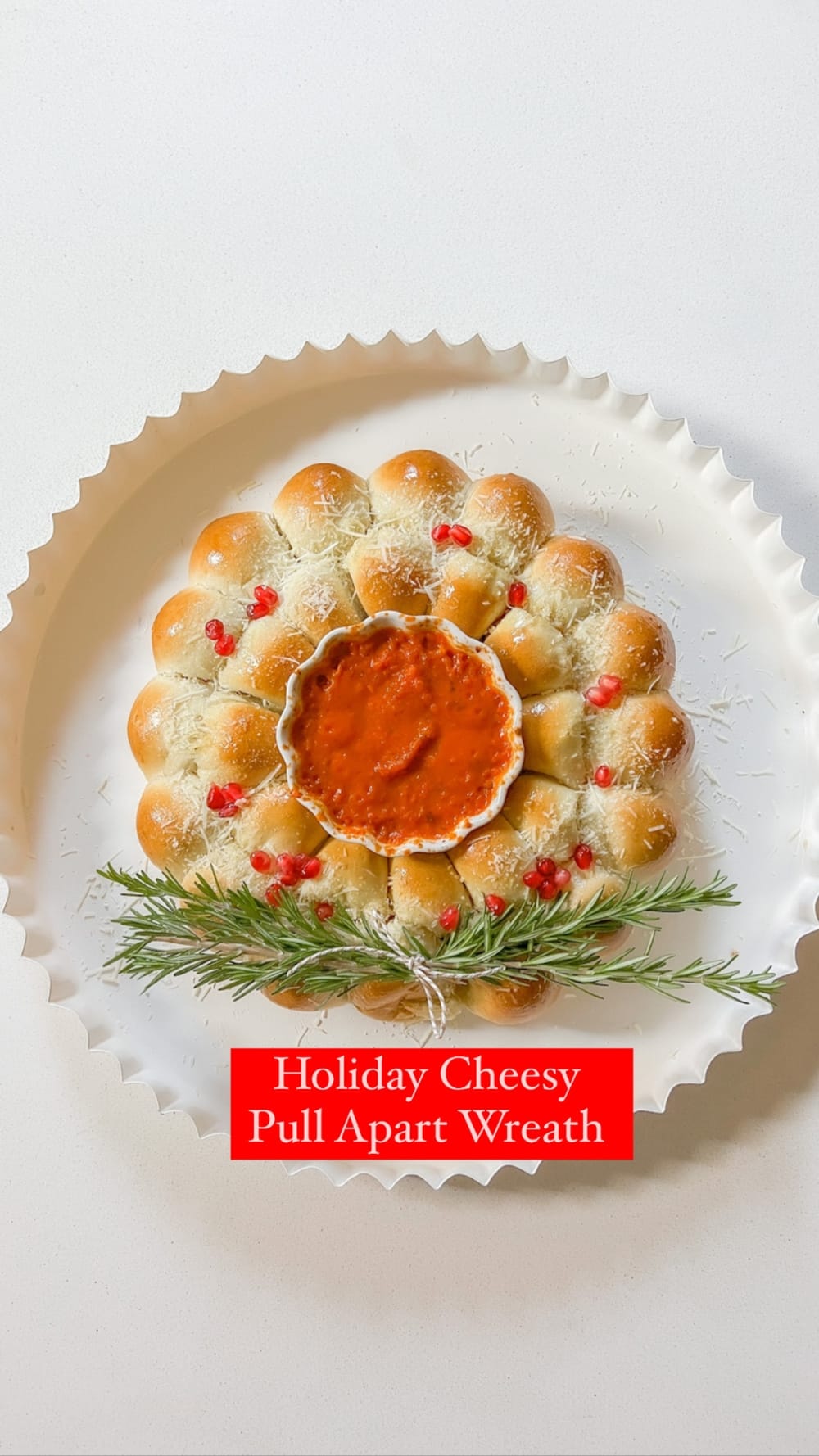 Holiday Cheesy Pull-Apart Bread Wreath. Golden rolls with a cheesy filling a perfect appetizer for holiday parties or for a night at home.