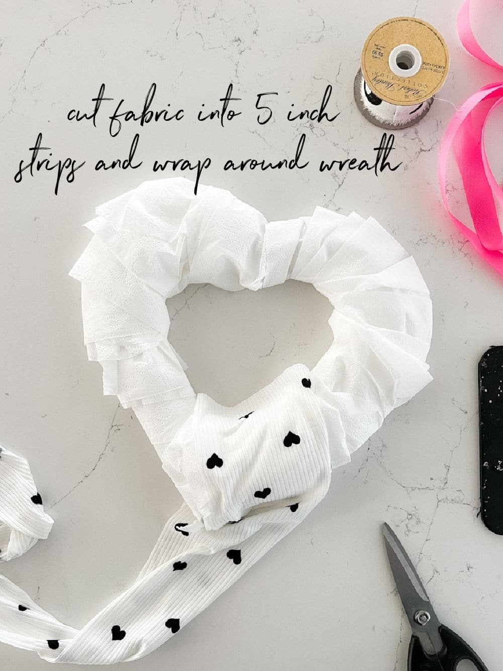 Dollar Store Valentine Heart Wreath. Grab a dollar store heart wreath form and turn it into an adorable wreath for Valentine's Day!