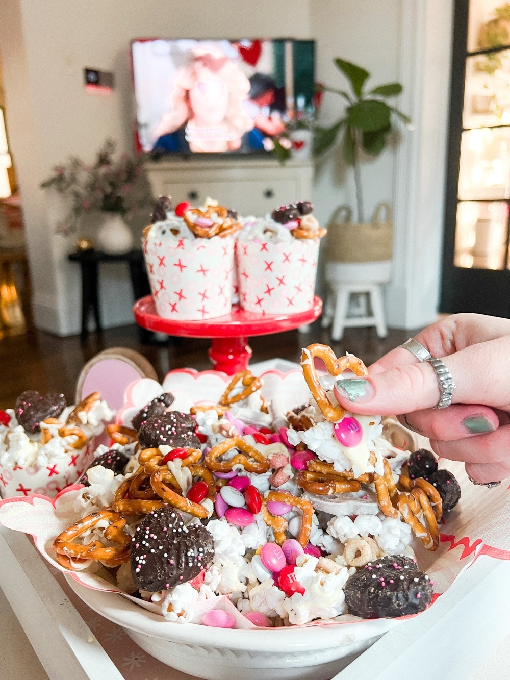 Sweet and Salty Valentine Snack Mix. Celebrate Valentine's Day this month with this yummy mix of pretzels, white chocolate, popcorn and candy. It's perfect for movie night, neighbor gifts or a lunch time snack! 