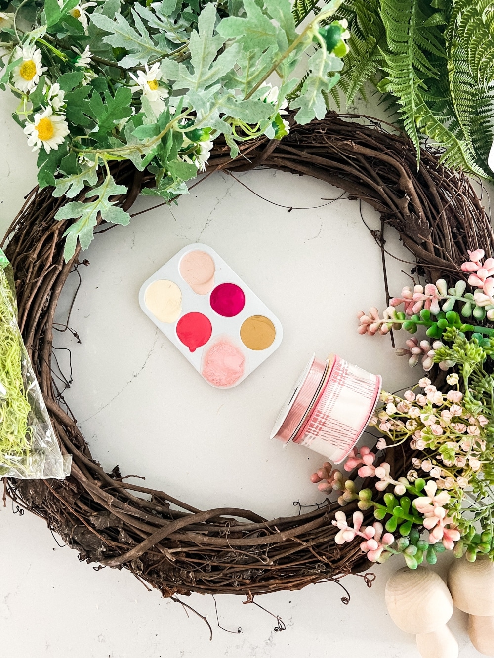 Spring Mushroom and Moss Wreath. Celebrate Spring by making this DIY wreath with wooden mushrooms, butterflies and moss!