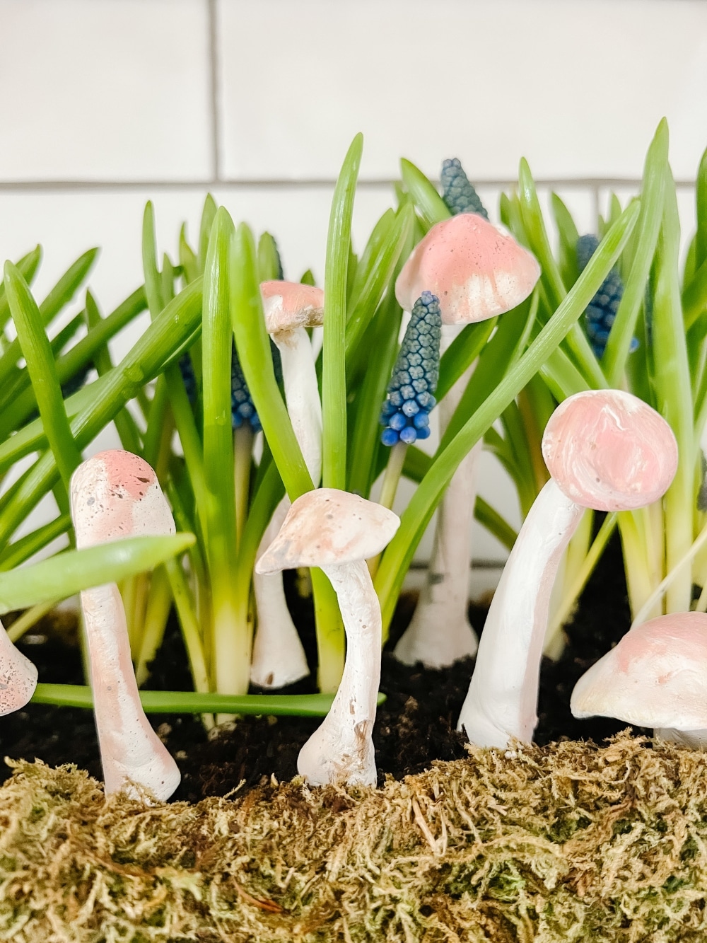 Anthropologie-Inspired Clay Mushroom Plant Stakes. Make these adorable clay mushroom stakes to add to planters and for Spring!