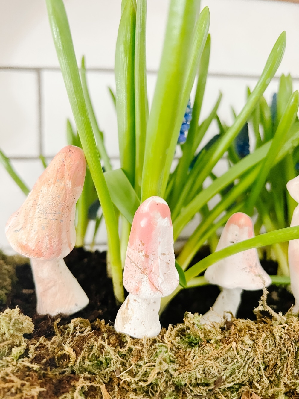 Anthropologie-Inspired Clay Mushroom Plant Stakes. Make these adorable clay mushroom stakes to add to planters and for Spring!