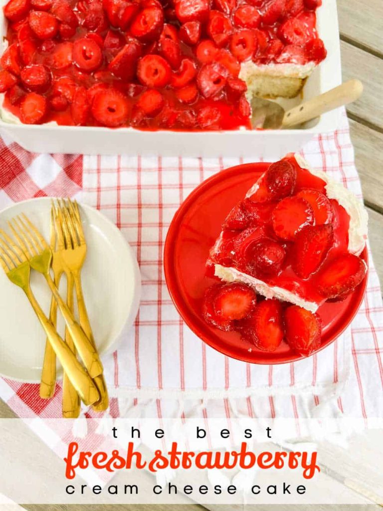 The BEST Fresh Strawberry Cream Cheese Cake Recipe. Moist white cake covered in a fluffy layer of cream cheese and whipped cream with a topping of luscious fresh strawberries in a sweet strawberry glaze. Everyone will fall in love with this delicious, easy cake.  