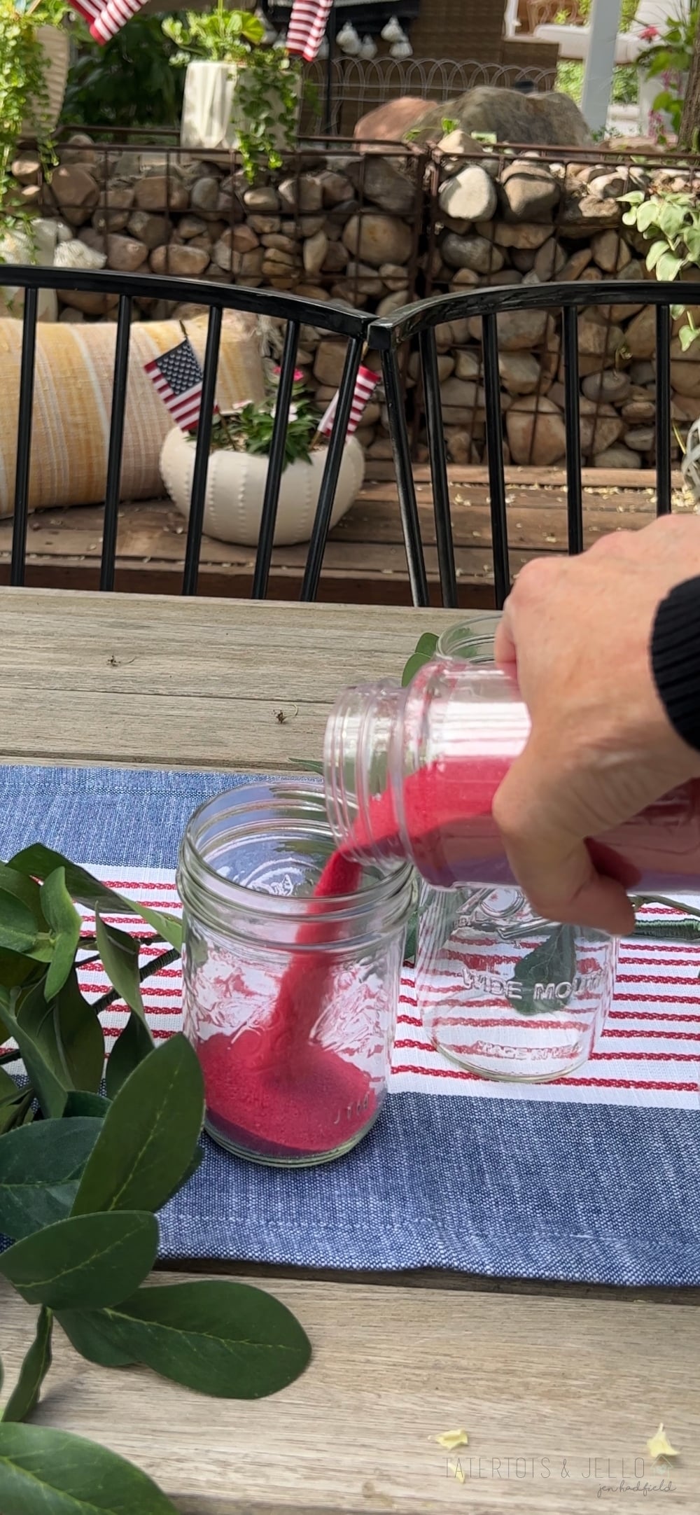 Easy Patriotic Candle Centerpiece. Celebrate summer by creating this simple layered sand centerpiece with battery-operated candles.