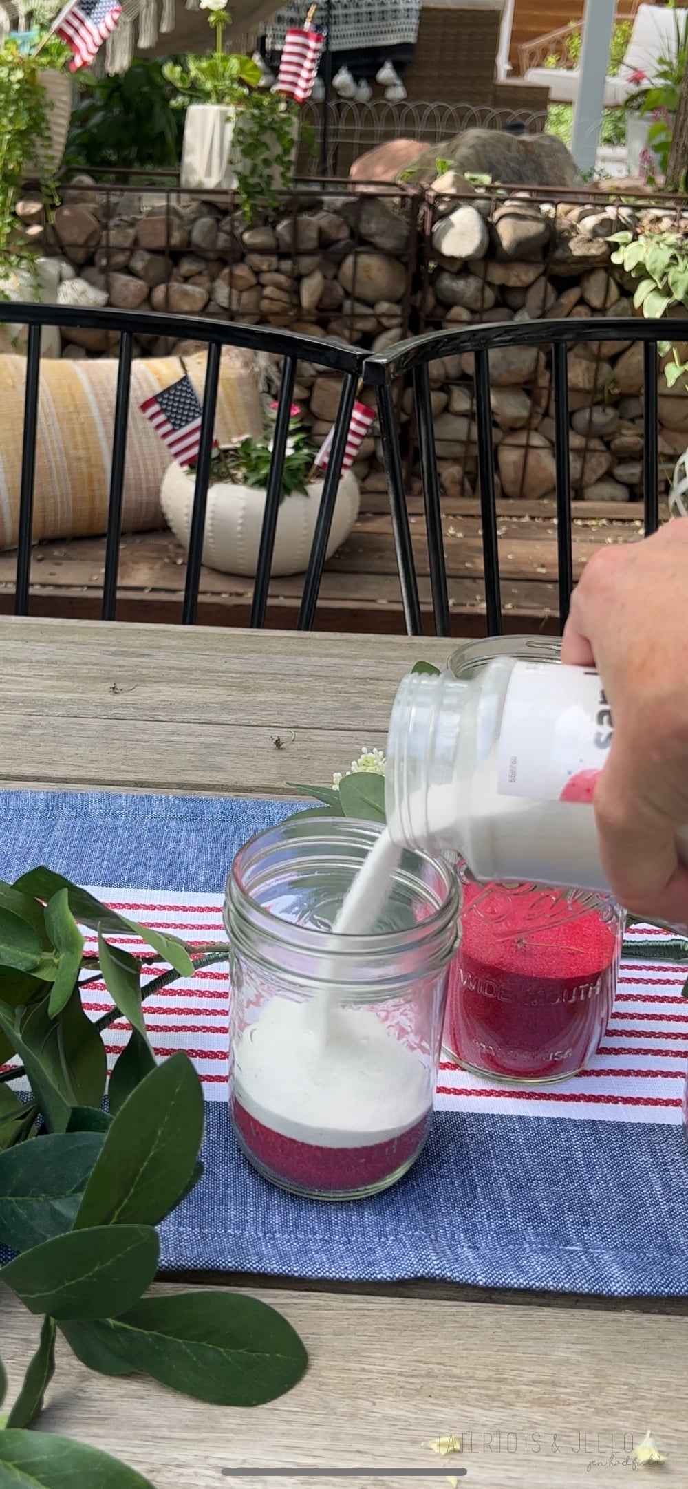 Easy Patriotic Candle Centerpiece. Celebrate summer by creating this simple layered sand centerpiece with battery-operated candles.