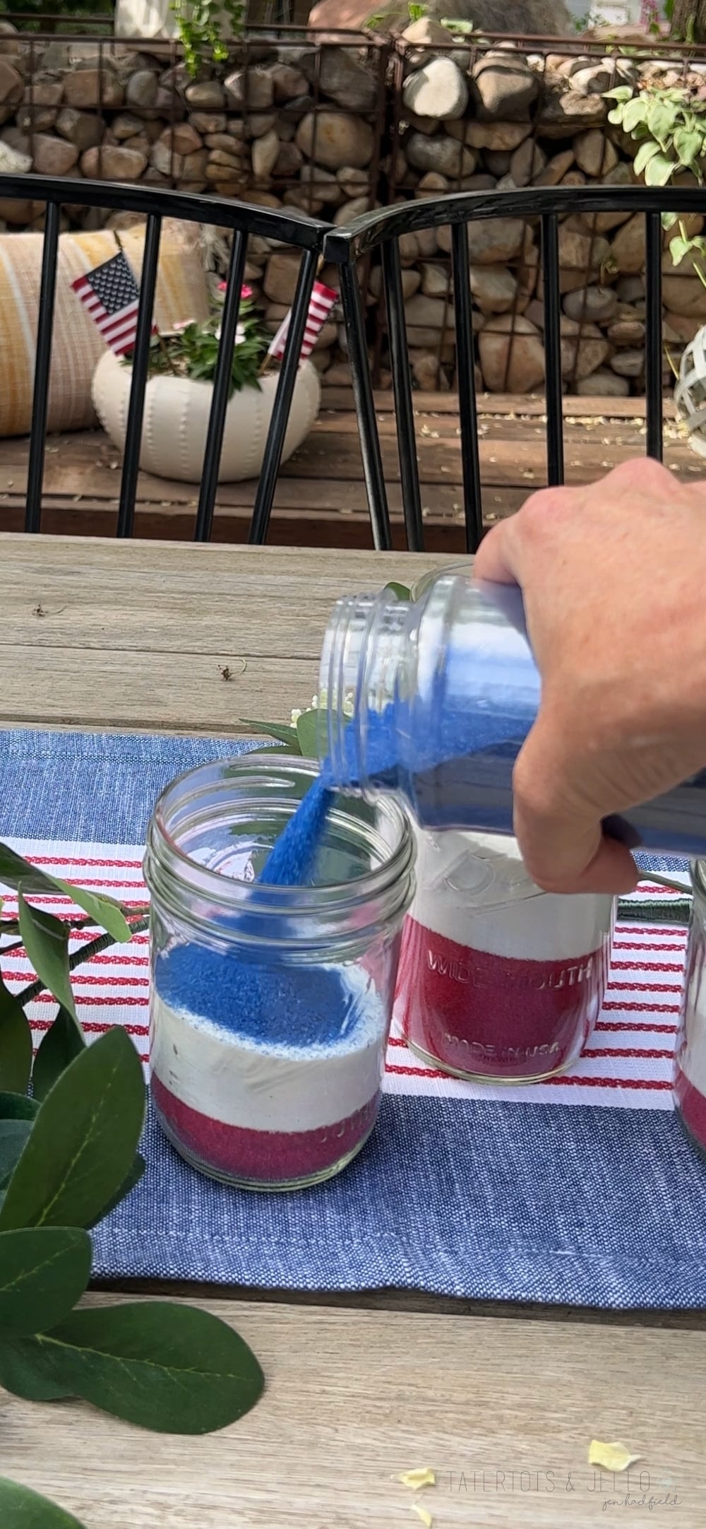 Easy Patriotic Candle Centerpiece. Celebrate summer by creating this simple layered sand centerpiece with battery-operated candles.