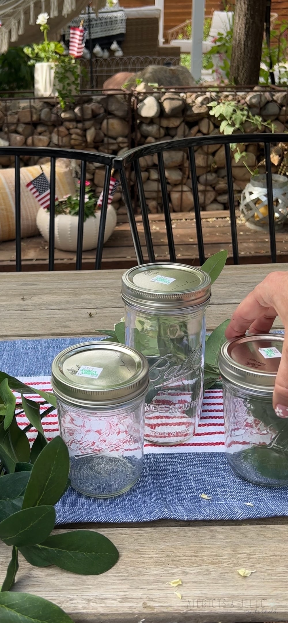 Easy Patriotic Candle Centerpiece. Celebrate summer by creating this simple layered sand centerpiece with battery-operated candles.