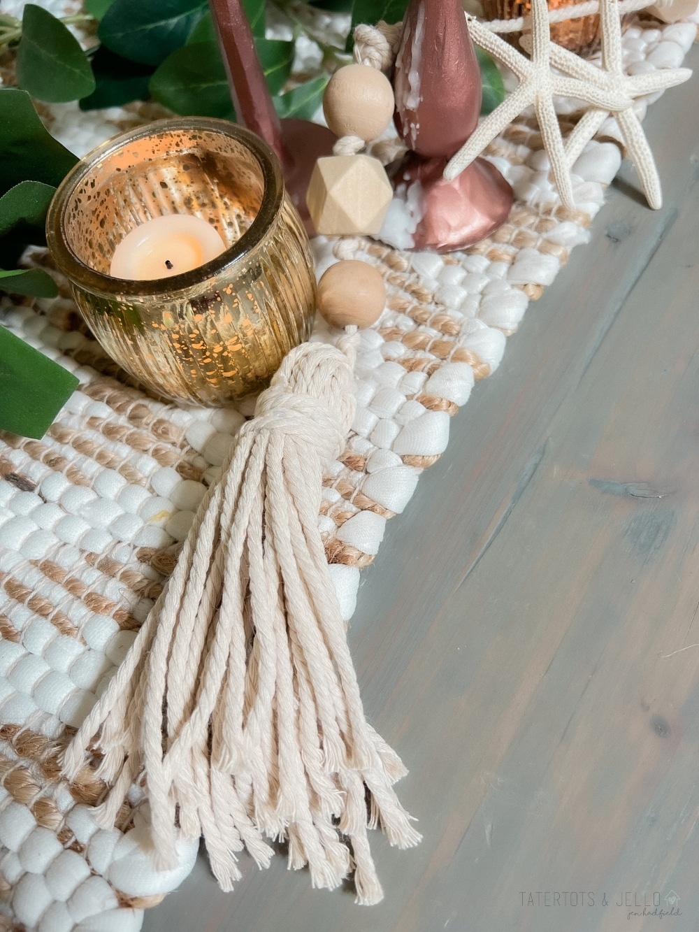 DIY Tassel and Bead Starfish Garland. Add a little boho flair to your home with this easy beaded boho starfish garland with tassels on both ends.