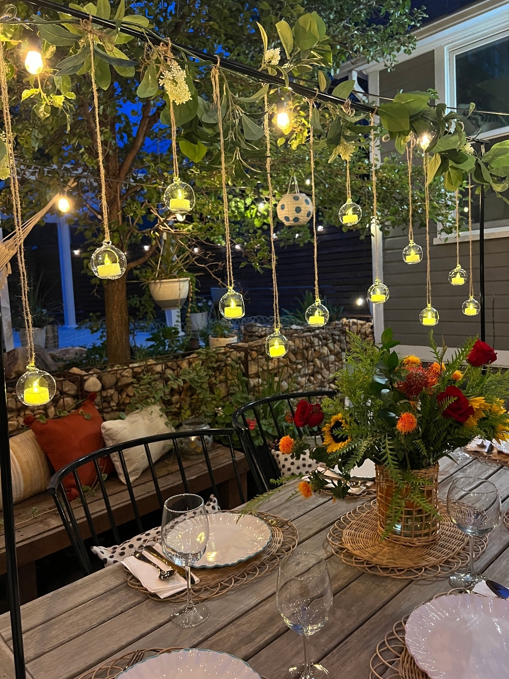 Floating Candle Summer Tablescape. Create the illusion of floating candles above your summer table with this ingenious over the table rod system. 