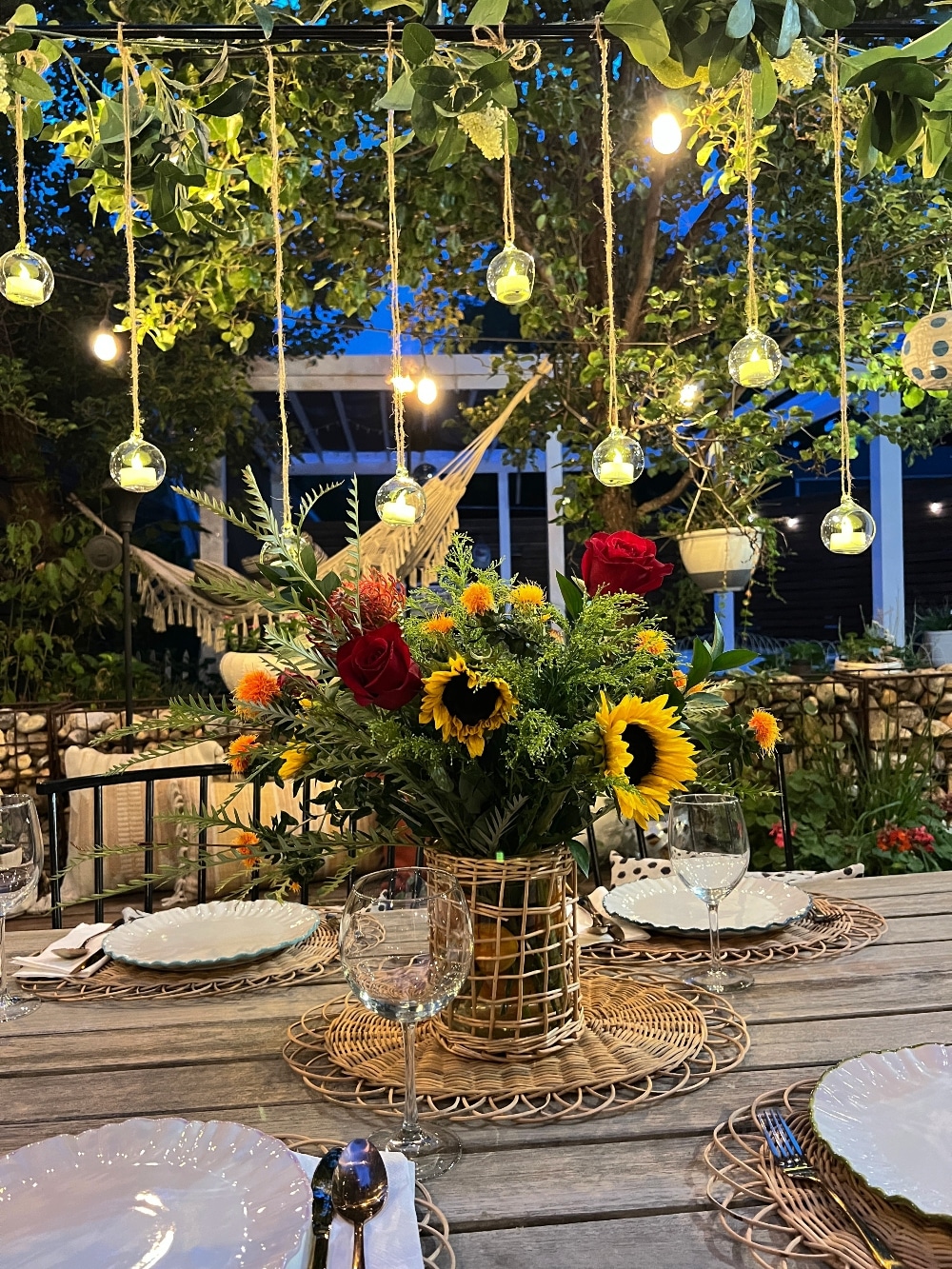 Floating Candle Summer Tablescape. Create the illusion of floating candles above your summer table with this ingenious over the table rod system. 