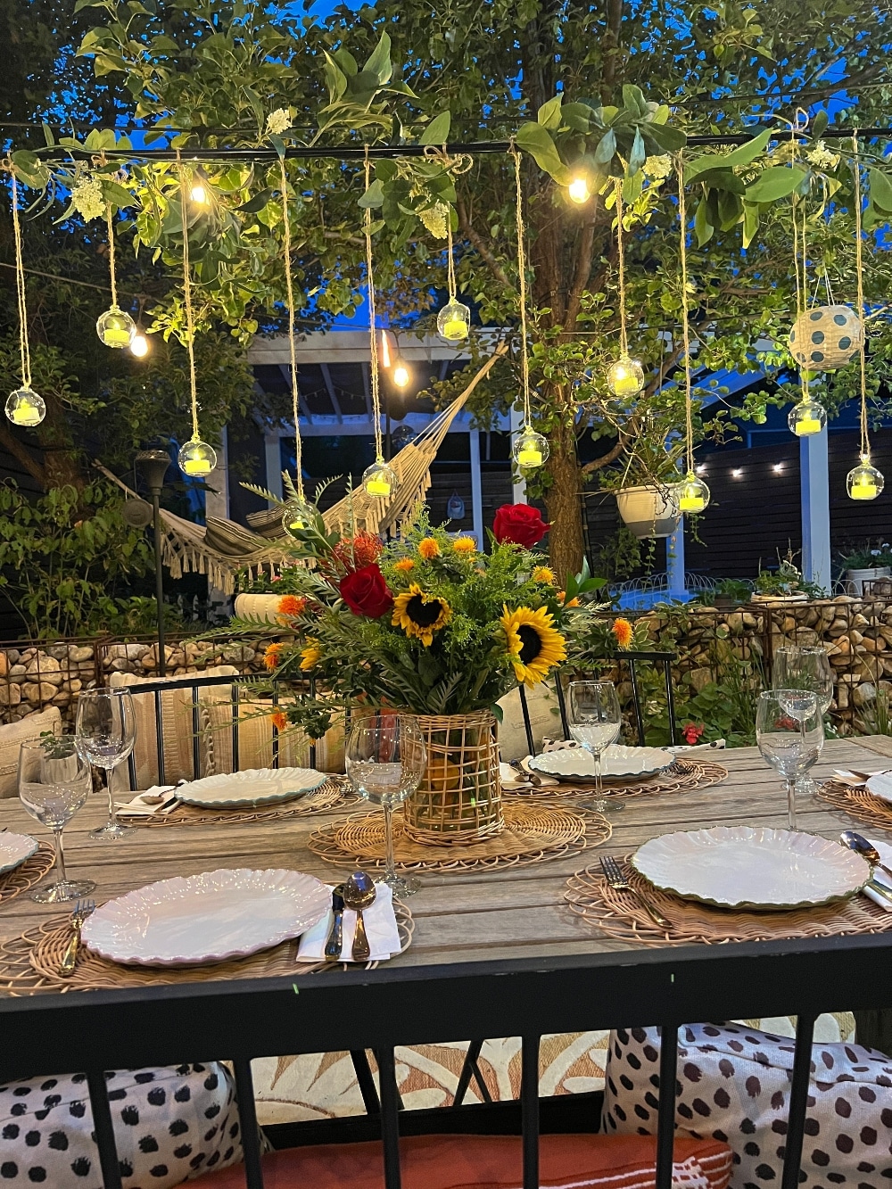 Floating Candle Summer Tablescape. Create the illusion of floating candles above your summer table with this ingenious over the table rod system. 