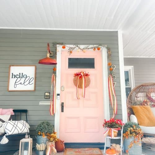 Embracing Autumn's Warmth: A Delightful Porch Transformation. Celebrate the crisp Fall season by incorporating a few simple items to transform your porch into a cozy Autumn haven.