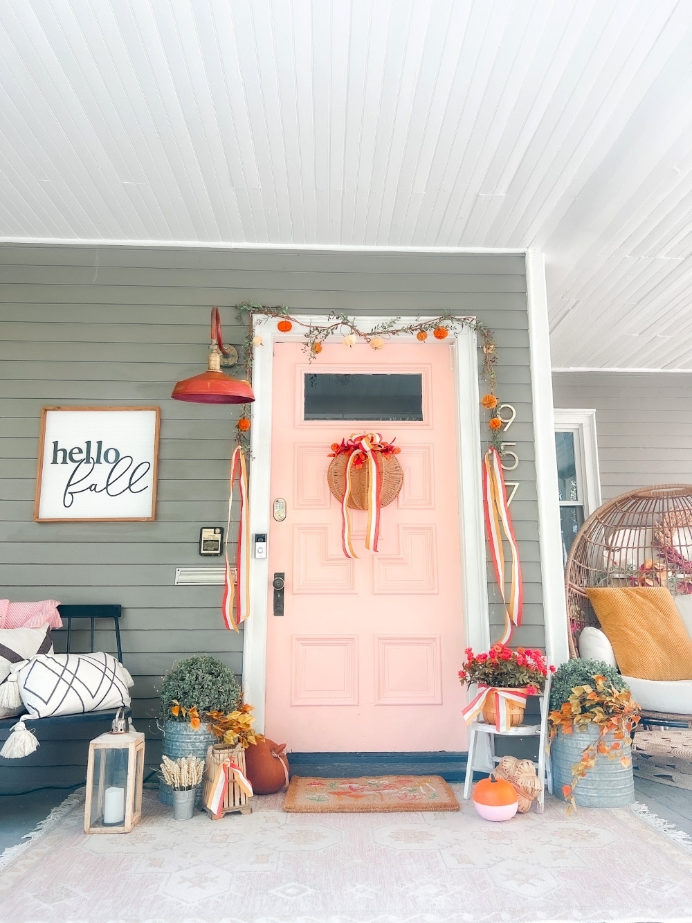 Embracing Autumn's Warmth: A Delightful Porch Transformation. Celebrate the crisp Fall season by incorporating a few simple items to transform your porch into a cozy Autumn haven.