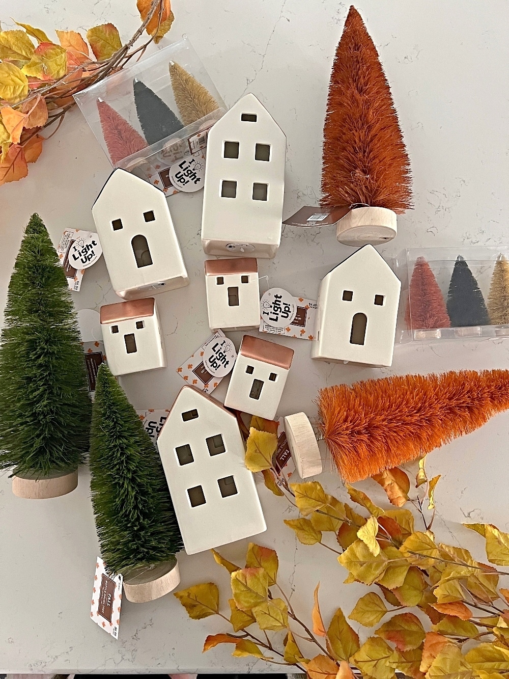 Fall Mantel and DIY Felt Leaf Garland. Get ready for fall with this cozy fall village mantel and DIY felt leaf garland!