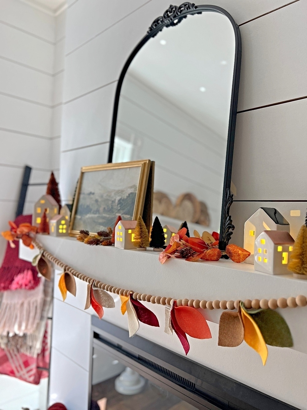 Fall Mantel and DIY Felt Leaf Garland. Get ready for fall with this cozy fall village mantel and DIY felt leaf garland!