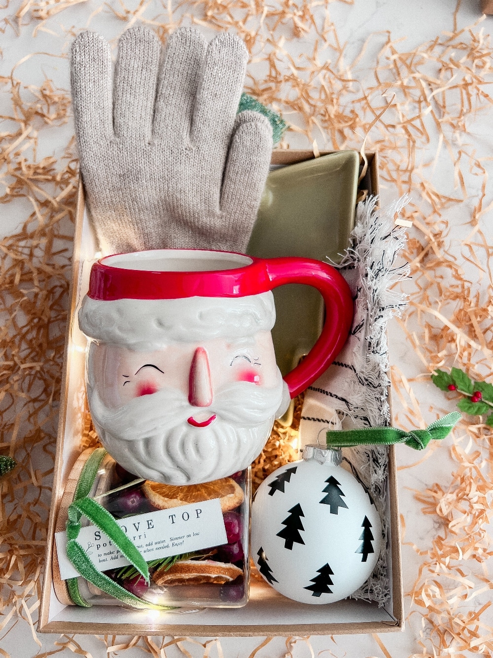 Warm and Cozy Hygge Christmas Gift Boxes. Gift your friends and neighbors with gift boxes full of warm and cozy items they can use this Christmas season! 