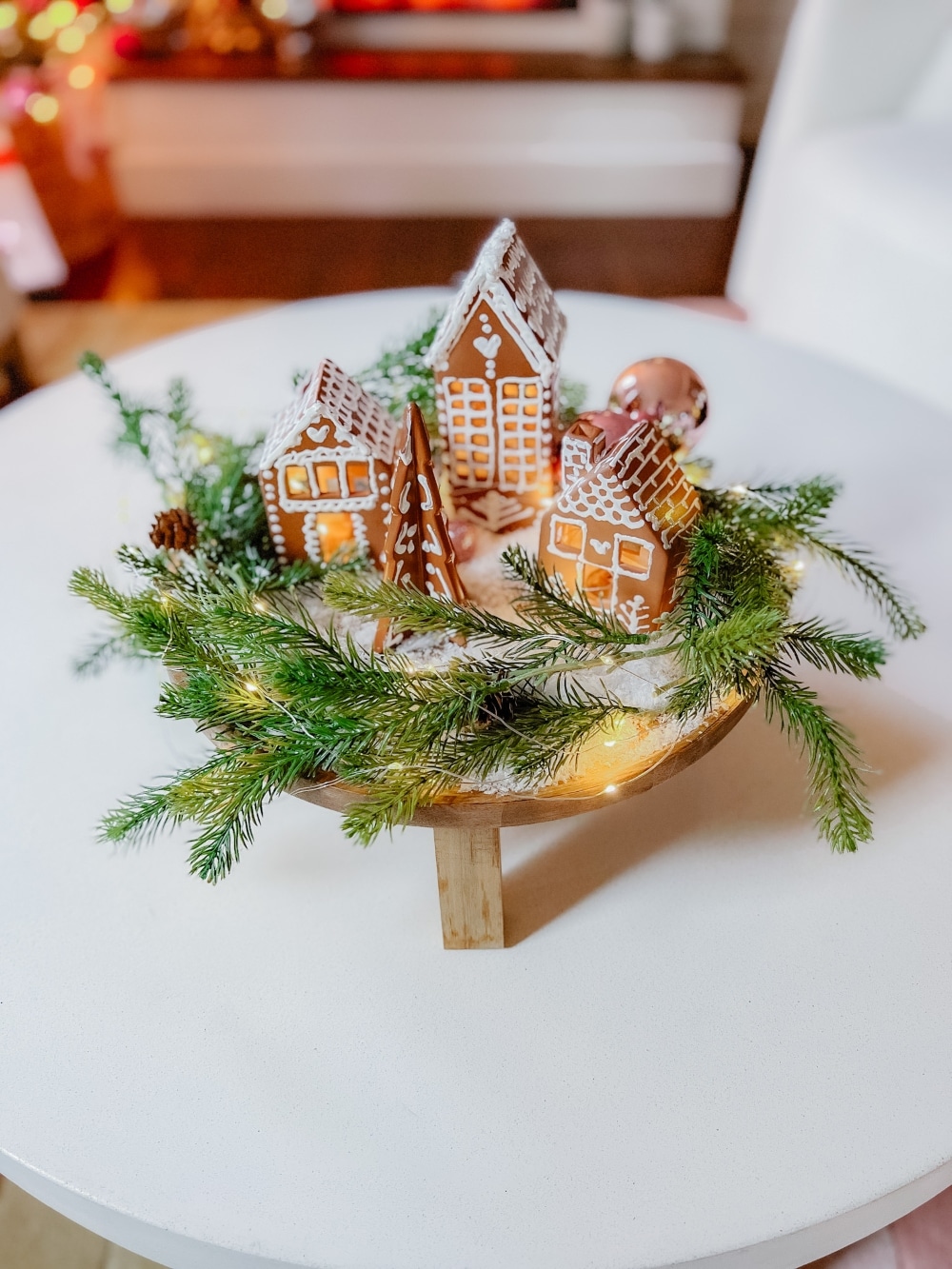Christmas Painted Gingerbread House Vignette. Explore the magic of Christmas with a  Christmas Painted Gingerbread House Vignette, where plain white farmhouse houses are transformed into charming gingerbread creating a cozy feeling for the holiday season.