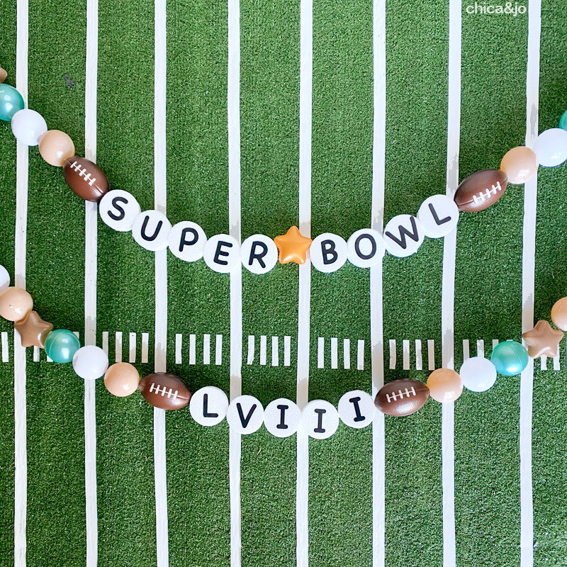 Get crafty with DIY Friendship Bracelet Garlands. Channel your inner Taylor Swift and create Super Bowl-themed  garlands that add a touch of nostalgia and charm to your Super Bowl decor.