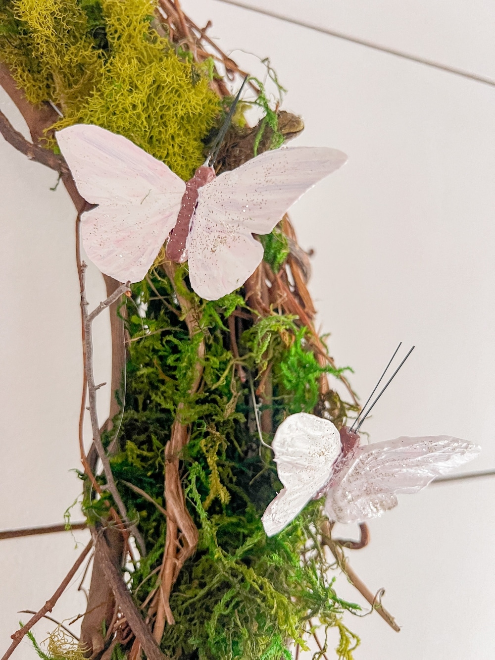 Spring Moss and Butterfly Wreath. Learn how to create a charming Spring Moss and Butterfly Wreath, perfect for welcoming the season with its rustic elegance and whimsical flair, plus 5 other DIY spring wreaths!  