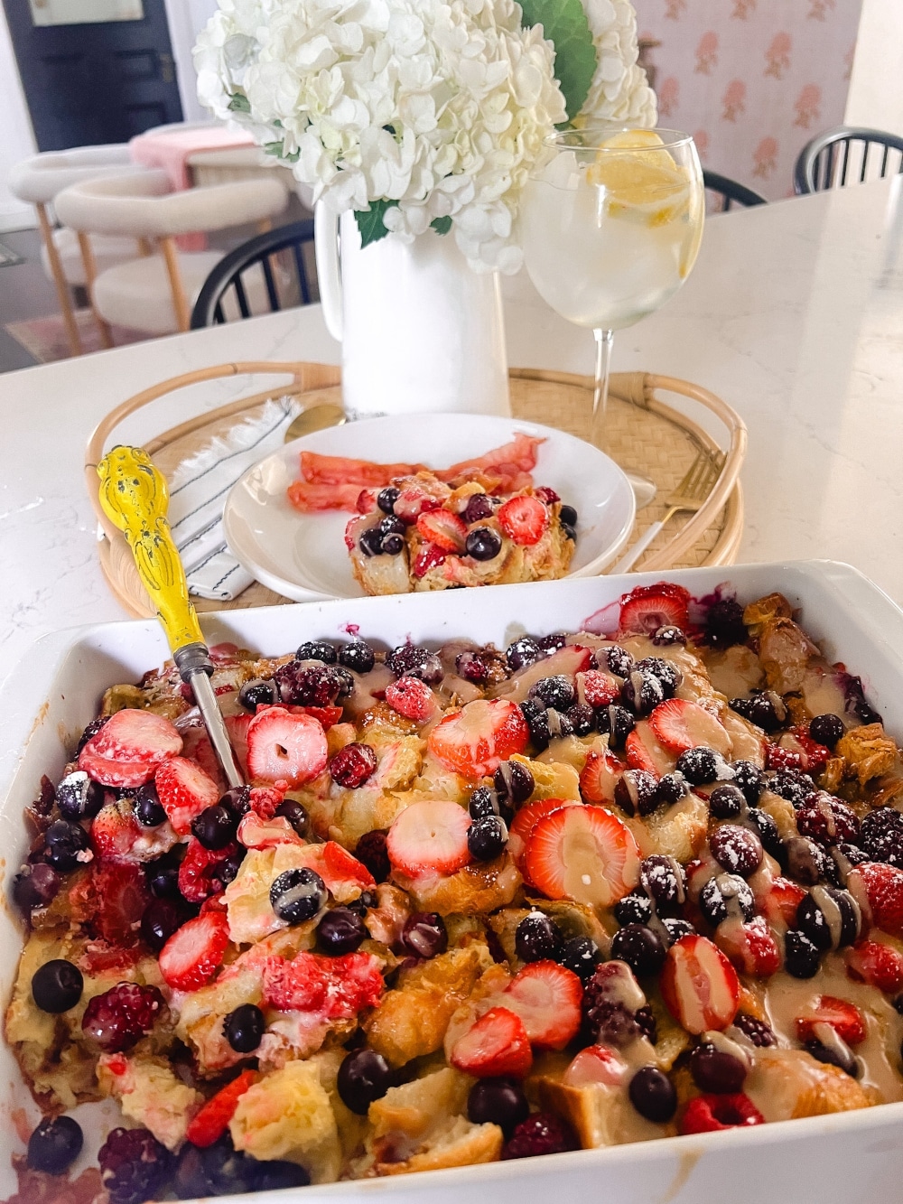 This Berry Croissant Breakfast Casserole combines buttery croissants, a custard filling and berries to create the most delicious breakfast bake. Prepare it the night before and just pop it in the oven for an easy overnight breakfast dish perfect for ANY occasion!