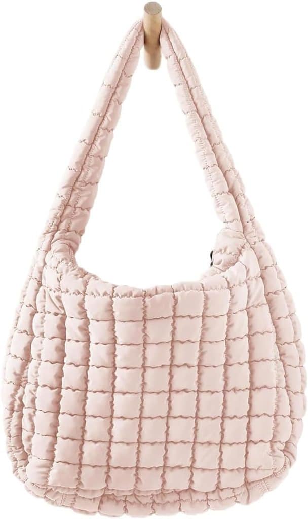 Quilted bags are all the rage right now. There are two exterior accessory pockets, and a small interior pocket in the main compartment. The bag itself is wide and spacious. It's perfect for so many uses! Mom will feel so stylish! 