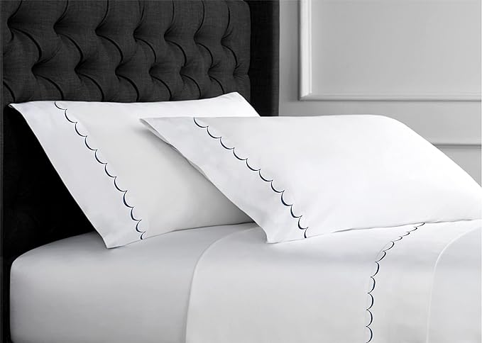 Mom will love climbing into bed with these luxury 600-thread count sheets with a sweet embroidered scalloped edge!
